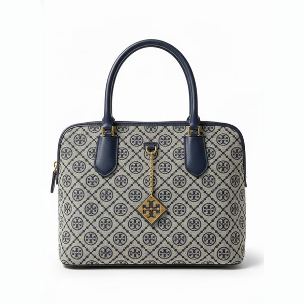 The T Burch Jacquard Swing Satchel.