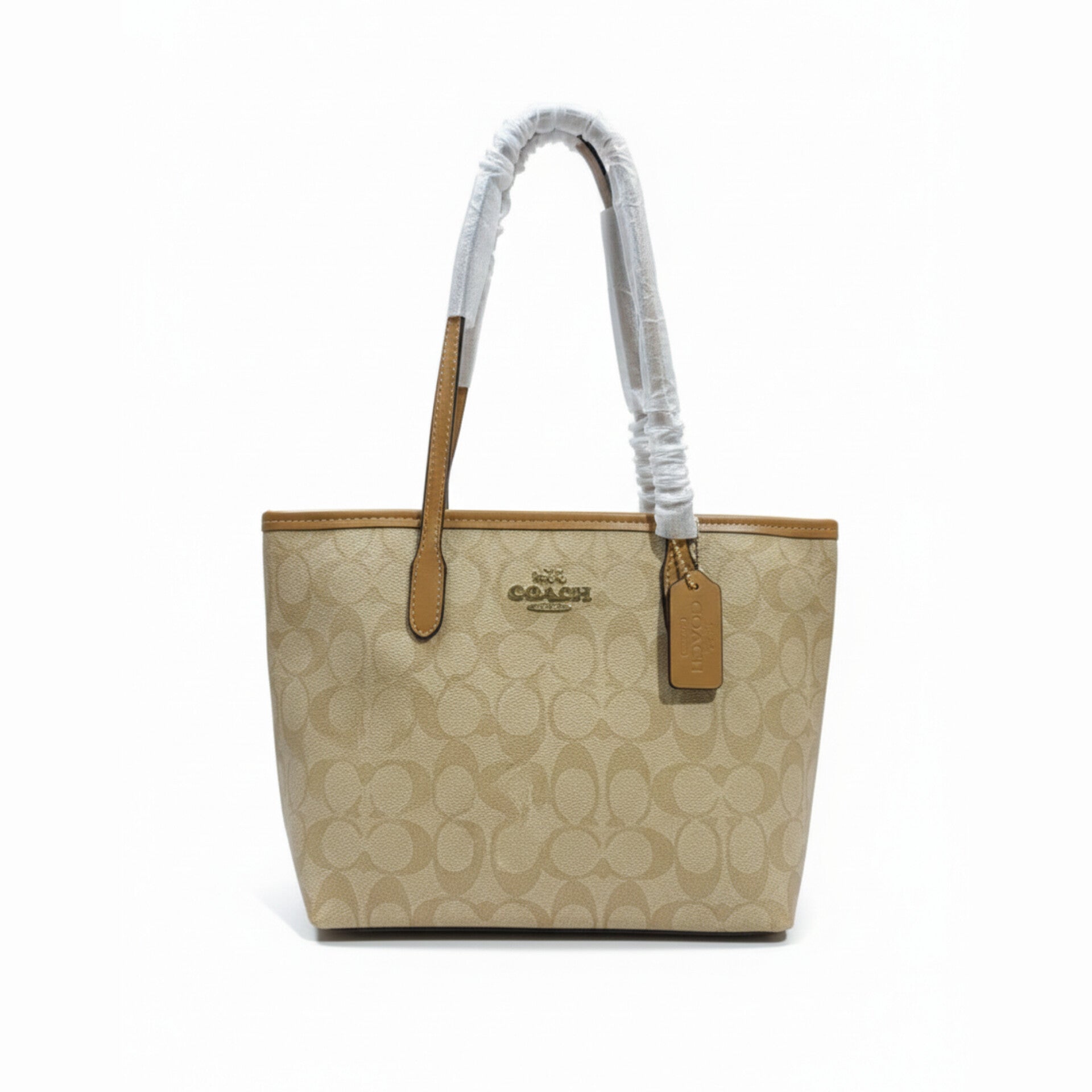 The Mini City Tote bag in signature canvas