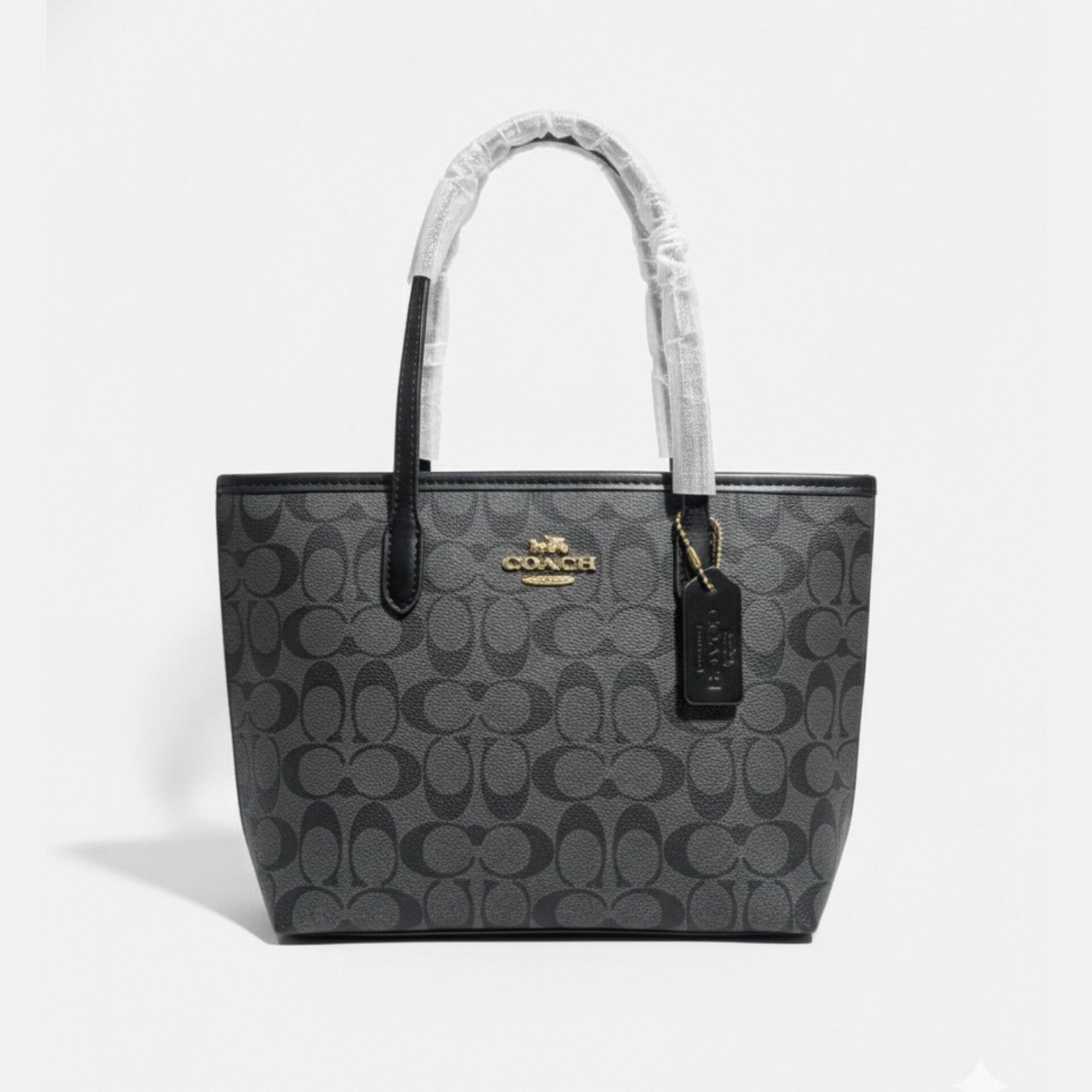 The Mini City Tote bag in signature canvas