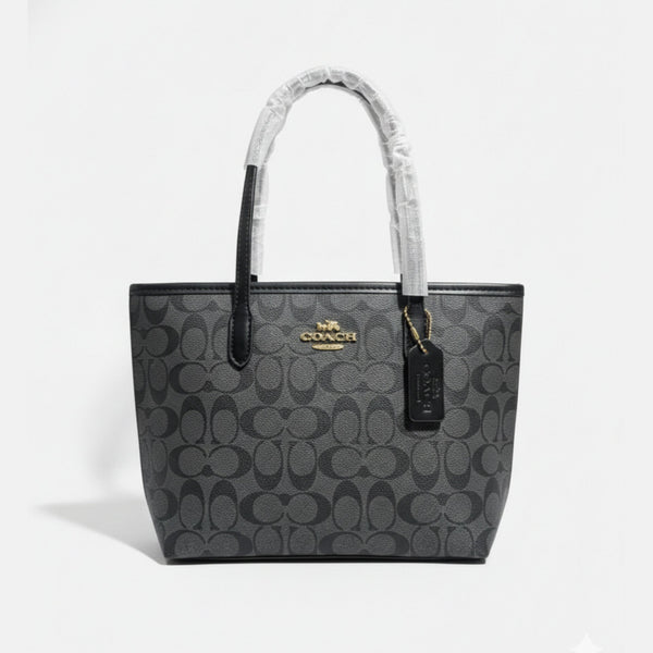 The Mini City Tote bag in signature canvas