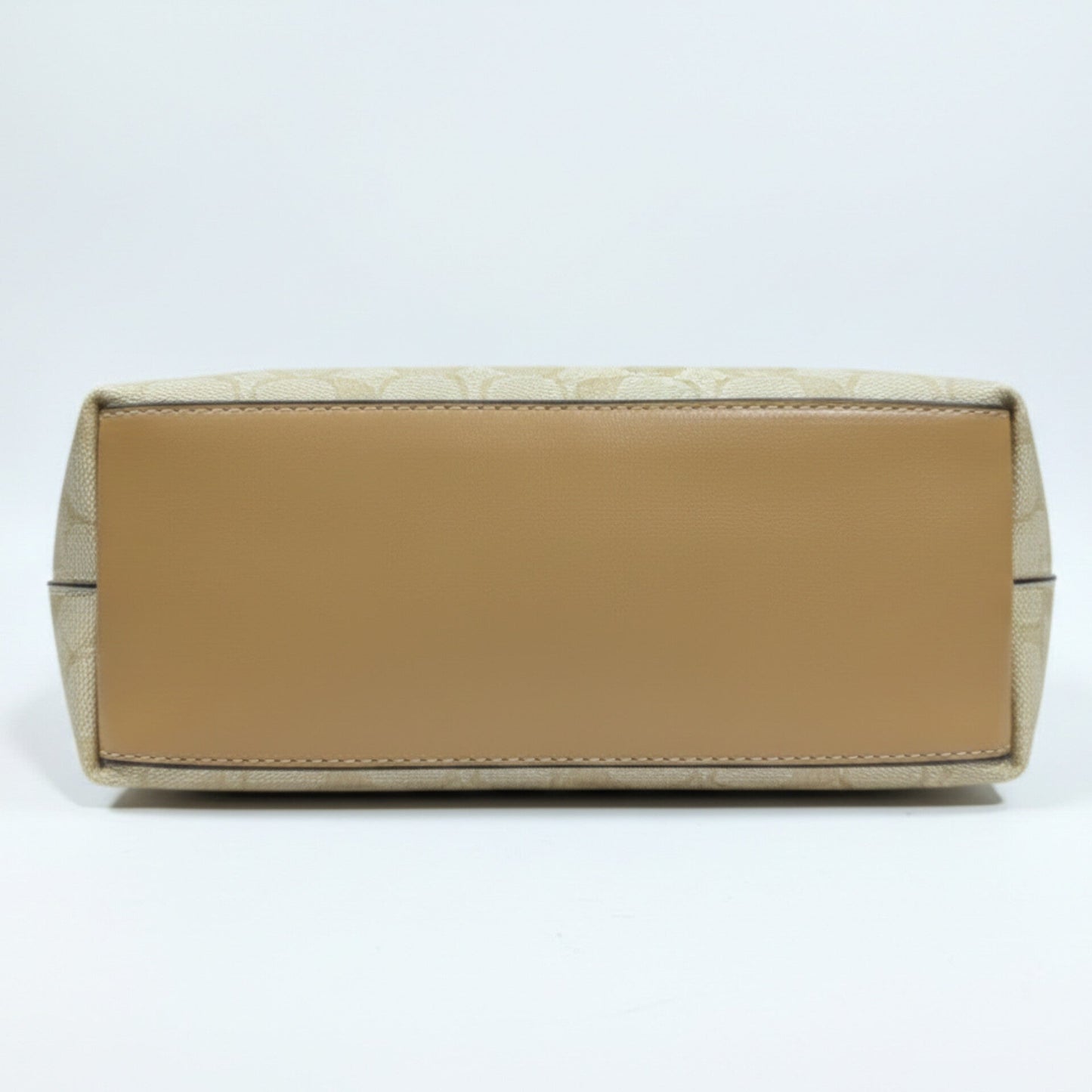 The Mini City Tote bag in signature canvas